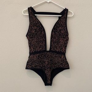 Beach Riot one piece bathsuit never worn. medium. Beaded design.